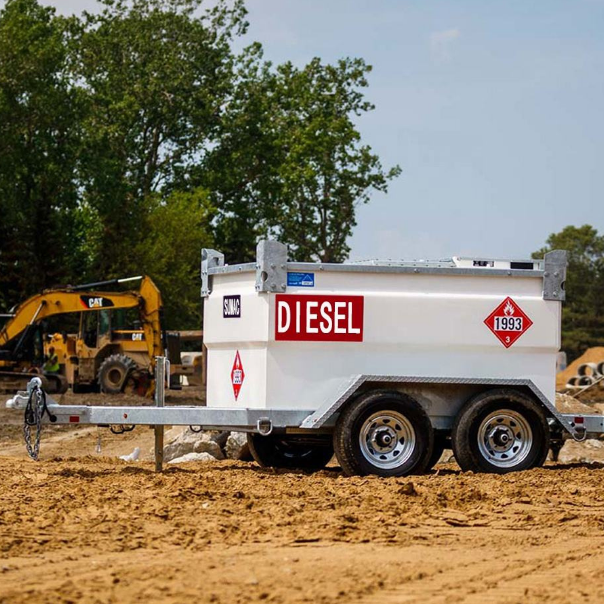 Towable self-bunded diesel fuel trailer tank on a construction site with heavy equipment